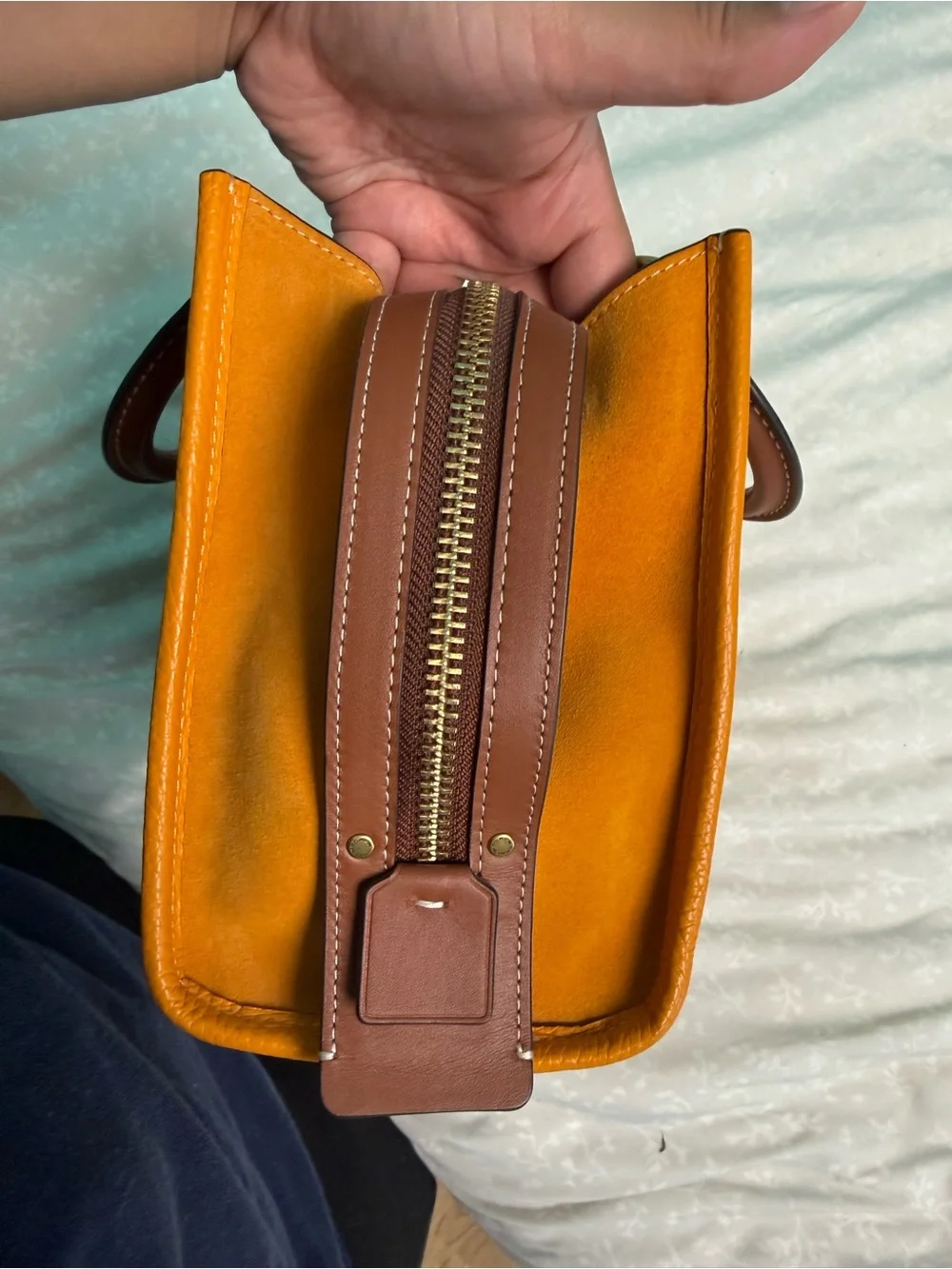 Coach Pebbled rouge 25 in papaya orange